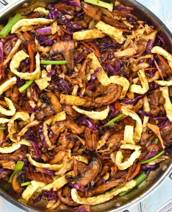 Moo Shu Chicken is a quick and easy stir fry bursting with flavor, highlighted by hoisin sauce. Serve with rice, or tortillas!